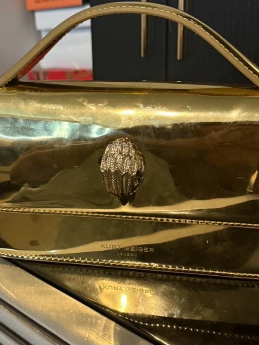 Kurt Geiger Gold Metallic Top-Handle Clutch with Acorn Accent